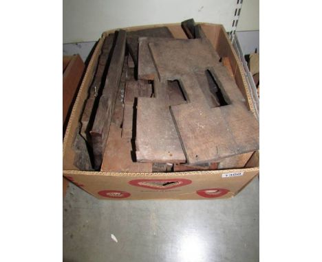 A box of longcase clock movement seat boards.