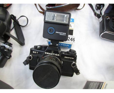 A Praktica BC1 camera with 1600A flashgun.