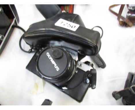 An Olympus OM10 camera.