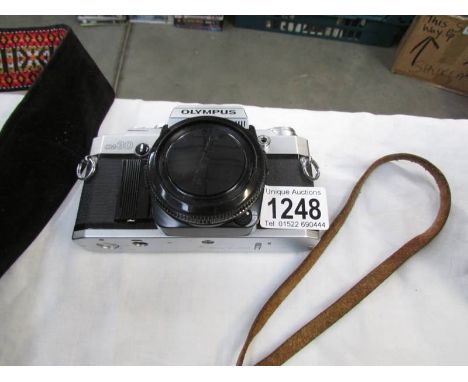 An Olympus OM30 camera.