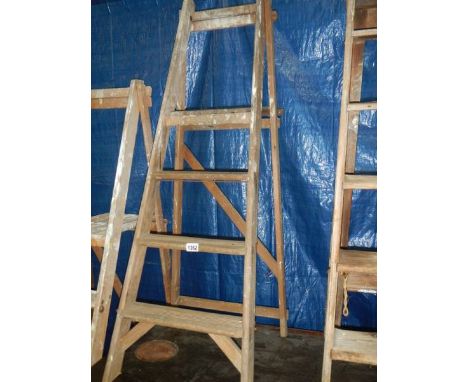 A wooden step ladder.