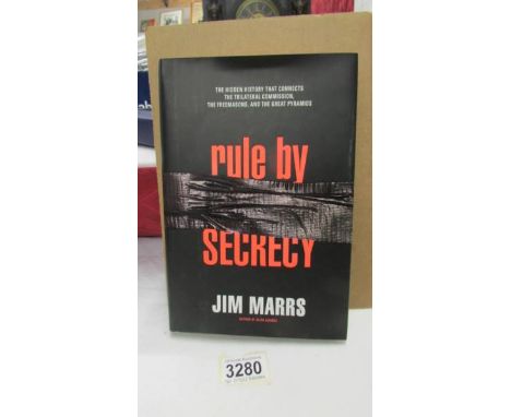 "Rule By Secrecy" by Jim Harris, first edition, signed by the author and in mint condition.