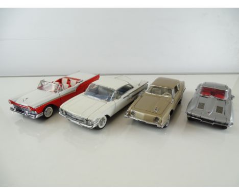 A group of diecast cars in 1:24 Scale by FRANKLIN MINT: comprising a 1957 Ford Fairlane 500 Skyliner, a 1963 Corvette Stingra