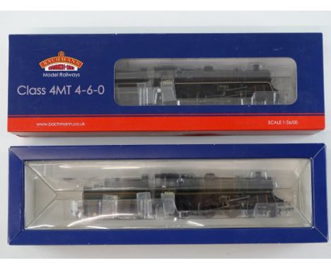 A pair of BACHMANN standard Class 4MT steam locomotives in BR black and green liveries (green version split from 60th Anniver