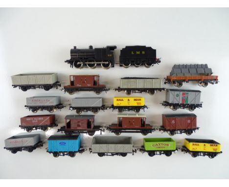 A group of HO Scale British Outline rolling stock by LIMA to include an LMS Class 4F steam loco and various wagons - G (unbox