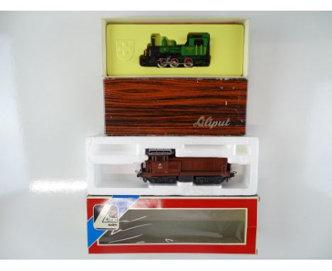 A pair of Swiss Outline locomotives comprising: a LIMA diesel locomotive and a steam locomotive by LILIPUT - G/VG in F/G boxe