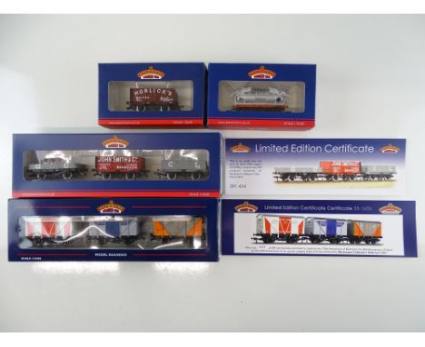 A group of BACHMANN limited edition wagons comprising two triple packs and two single wagons - VG/E in G/VG boxes (graffiti t