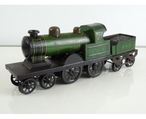 A large scale clockwork floor operating locomotive and tender by WHITANCO c.1912-1924 in GNR green livery - G unboxed