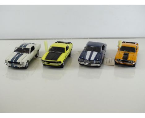 A group of diecast cars in 1:24 Scale by FRANKLIN MINT: comprising a 1970 Ford Mustang Mach 1, a 1970 Chevelle SS 454, a 1969