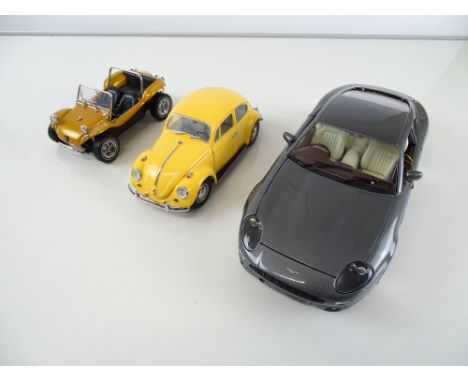 A group of diecast cars in 1:24 and 1:18 Scale by FRANKLIN MINT and GUILOY: comprising The Meyers Manx Dune Buggy, a 1967 Vol