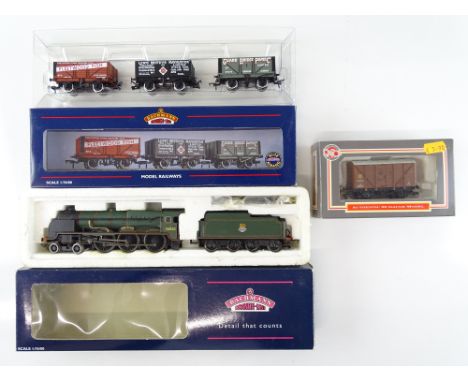 A group of BACHMANN and DAPOL rolling stock comprising a Lord Nelson Class steam locomotive, a triple wagon pack and another 