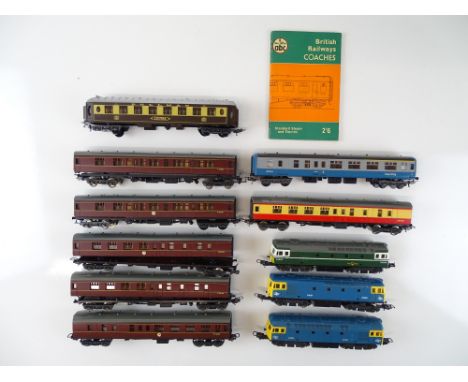 A group of HO Scale British Outline diesel locomotives and coaches by LIMA - comprising 3 x Class 33 diesel locomotives and 8