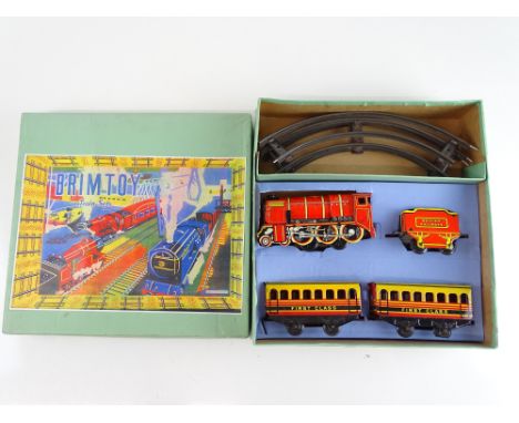 A BRIMTOY O gauge clockwork tinplate train set with "Britannia" locomotive - G in G reproduction box