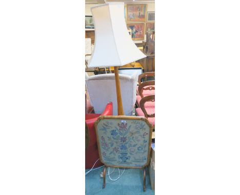 A firsecreen with woolwork panel and a standard lamp (2) Condition Report: Available upon request