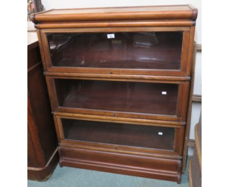A Globe Wernicke three tier stacking sectional bookcase, 112cm high x 87cm wide x 27cm deep Condition Report: Available upon 