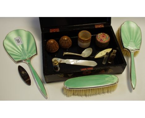 A silver and enamel backed dressing table set comprising clothes &amp; hairbrush and hand mirror, Birmingham, 1934 ; 2 miniat