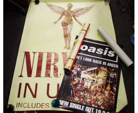 Music interest - a Nirvana poster titled 'UTERO includes Heart Shaped Box' and an image of a medical cutaway model of human; 