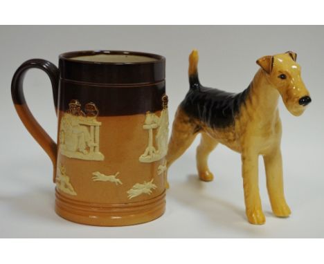 A Beswick model, Cast Iron Monarch by Arthur Gredington, printed marks; a Royal Doulton saltglazed tankard