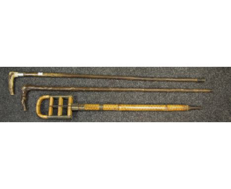 A 19th century bamboo shooting stick; a silver mounted working stick, etc 