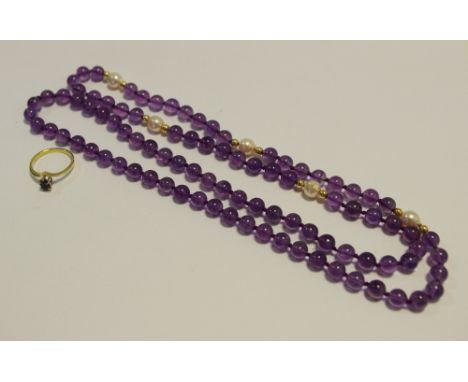 A 9ct gold solitaire ring set with a single pear shaped sapphire; an amethyst necklace with five blush pink natural pearls
