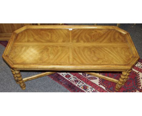 A Drexel Chartwell coffee table, chamfered rectangular top, bobbin 'turned' supports, X-stretcher, bun feet, 133cm long