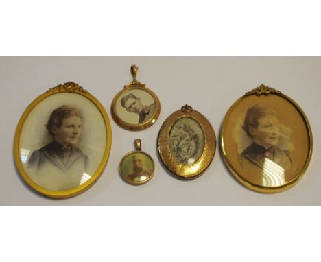 A 9ct gold circular double sided photograph locket; another smaller;  a gilt metal locket portrait miniature of a young gentl