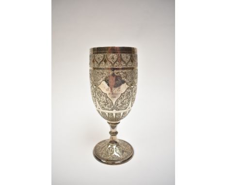 A highly ornate Edwardian silver wine goblet with all-over acanthus detail.&nbsp; Cartouche inscribed.&nbsp; 15.5cm tall, 173