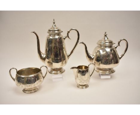 Danish silver Harlequin 4 piece teaset with similar design but different Master Assay marks and makers marks. The teapot and 
