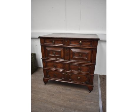 A circa 1670 Charles II country oak two section "Garret" chest of four long drawers (with grooved runners) and geometric moul
