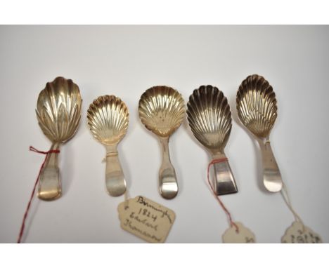 Five silver tea caddy spoons with shell form bowls including Edward Thomason, Birmingham 1824, and William Eley I &amp; Willi