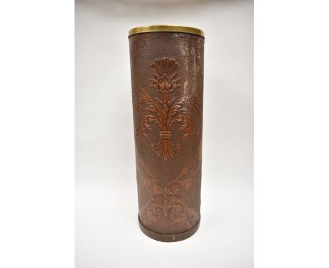 A 1920's French stick stand by Lincrusta Loreid in patterned faux leather with brass banded rim, height 59cm x diameter 21cm
