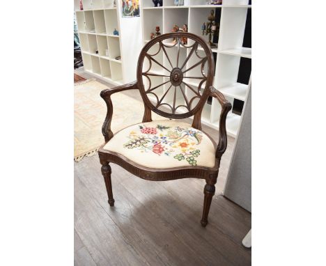 A 20th Century Adam style spiderweb-back armchair with tapestry seat, 93cm tall x 65 cm wide