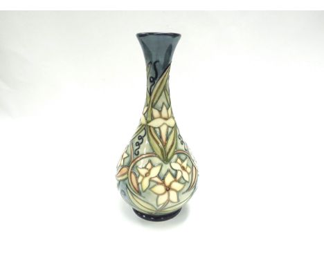 A Moorcroft Carousel Jasmine pattern vase with elongated neck, numbered 994, WM to base, second, 24cm tall