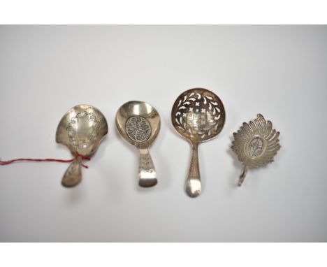 Four silver tea caddy straining spoons including Joseph Willmare, Birmingham 1807 and another with date letter for 1806.  30g