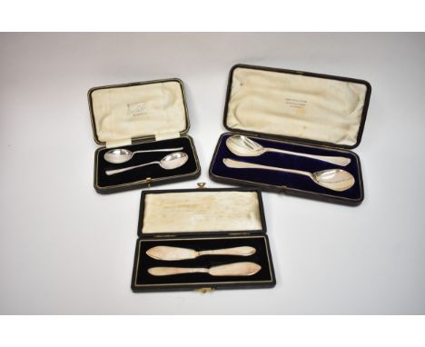 Cased silver flatware in Scottish retail boxes including a pair of Lothian &amp; Robertson serving spoons, Edinburgh 1848, pa