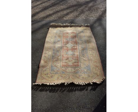 A handmade Chinese rug, 190cm x 121cm