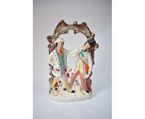 A Victorian Staffordshire figure depicting Thomas Smith Junior and William Collier who was a convicted poacher hung in 1866 f