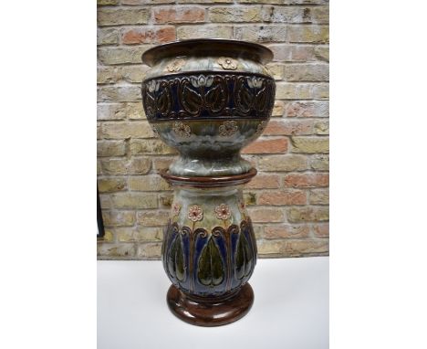 A late 19th Century Royal Doulton green glazed majolica jardinière and stand numbered 2806.  Stand height 46cm with 30cm diam