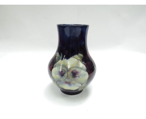 A Moorcroft Pansy pattern vase, 13cm tall, boxed