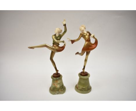 JOSEF LORENZL (1892-1950): Two ivory and bronze sculptures of dancer, raised on green onyx pedestal, base damaged to one.  24