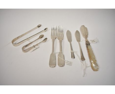 Mixed silver including two sets of sugar tongs, London 1899 and 1832.  Two silver butter knives, London 1898, 1943 mother-of-