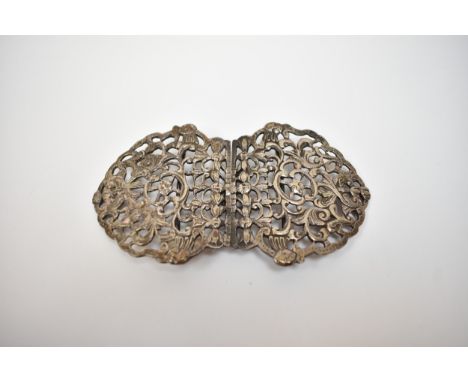 A Victorian William Neale highly ornate silver buckle decorated with mask, leaves and scroll, Birmingham 1894, 12cm x 6.5cm. 