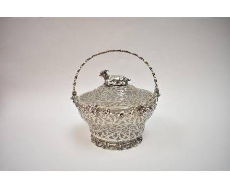 A Victorian Charles Thomas Fox &amp; George Fox highly ornate silver pierced butter dish/covered bowl with swing handle.  The