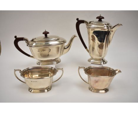 An Adie Brothers Ltd three piece silver tea set with Bakelite knops and handle, Birmingham 1955, with later added coffee pot 
