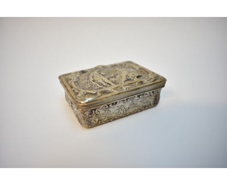 Possibly French, a silver high relief snuff box.  The lid decorated with a classical figural scene.  The front and back decor
