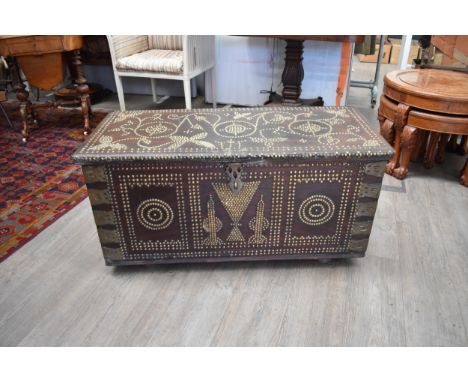 An Islamic hardwood brass stud decorated Brides chest with carrying handles, 51cm x 104cm x 46cm
