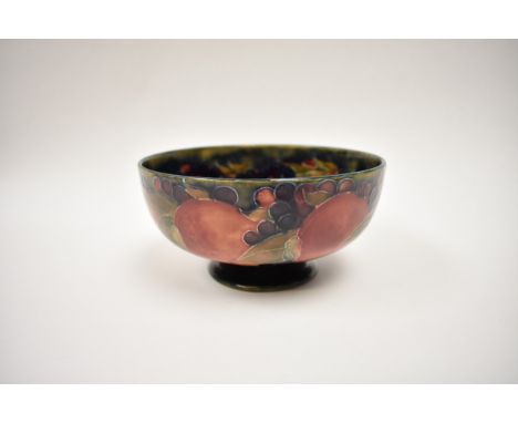 William Moorcroft "Pomegranate" pattern bowl.  Scratches and scuffing to interior of bowl.  8.5cm tall, 16.5cm diameter