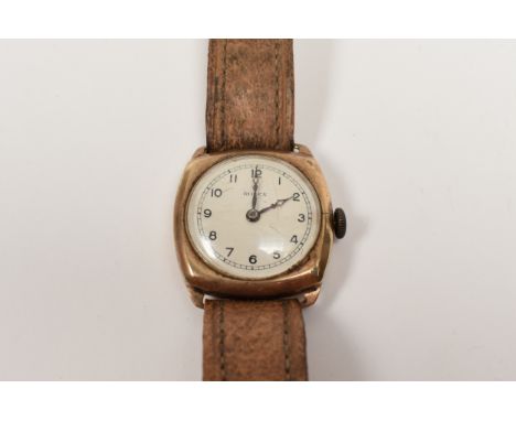 ROLEX: A 9ct gold gentleman's wristwatch circa 1920-30, Arabic dial, brown leather strap