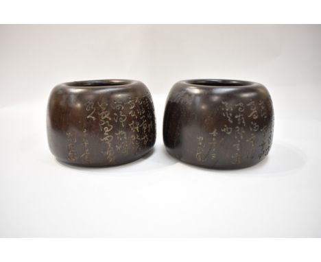 A pair of Chinese Zitan hardwood Go/Wei-Chi counter bowls, both with inscription, cracks throughout but no major damage, 8cm 