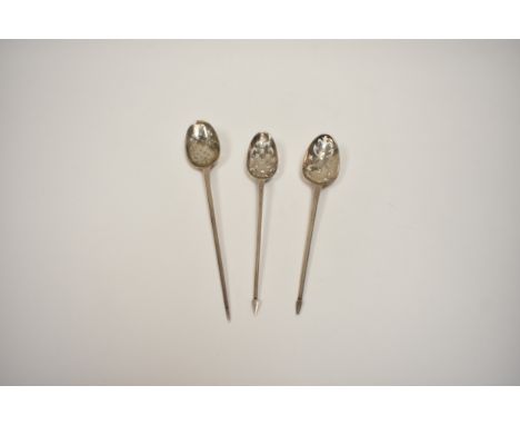 Three Georgian silver Mote spoons, all with shell backs including Ebenezer Coker (circa 1750's) with initialled bowl RHS.  13